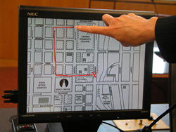 Courtroom presentation of fire department vehicle emergency route and discrepancies of official report regarding turns and speed. Seattle, Tacoma.