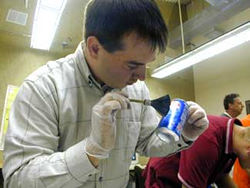 Latent fingerprint development can be subjective to error and incompetence of the technician.